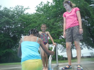 The kids in this program were told I was just helping for one day to prevent attachment. I was able to utilize my childcare and health skills in the pool and at the park. (The kids also got the treat of sharing my waterproof camera in the pool!)